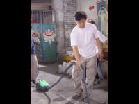 Vacuuming the set.