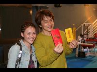 Jackie with Yangyang, who presented him with donations to JC Charitable Foundation.