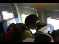 Jackie's personal videographer, X Lee, videotapes the arrival in Guizhou.