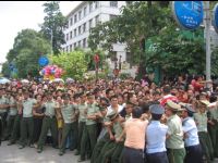Chinese police worked very hard to contain the crowds of people that struggled to see Jackie.