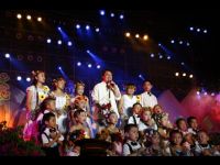 Jackie with some of the young performers.