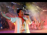 Jackie sings at the concert at Du Yun Development Area Sports Center.