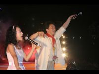 Jackie sings at the concert at Du Yun Development Area Sports Center.