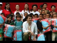 Jackie poses with the children.
