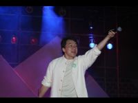 Jackie sings at the concert at Du Yun Development Area Sports Center.