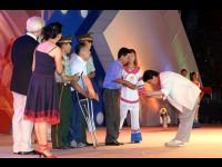 Jackie bows out of respect for this teacher who used his own money to buy supplies for students in Guizhou.