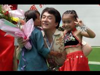 Jackie gets a welcome kiss from a little girl whose story would later make him cry.
