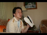 Back at his hotel, Jackie examines the shoes that took two months to make.