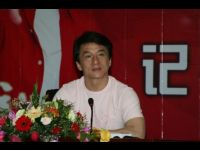 Jackie attends a press conference.