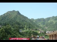 The area surrounding the school. People climbed the hills and fence to have a look at Big Brother Jackie.