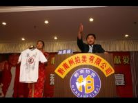 This is the auctioneer who steadfastly pushed the bidders to offer as much money as possible for the charity.