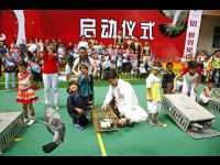 Jackie and the children release birds as a symbol of peace.