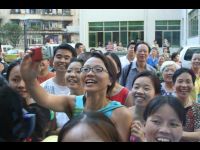 Fans outside the hotel.