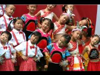 Young dancers at a state-run kindergarten perform for Jackie.