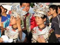 Tribe members wearing traditional clothing.