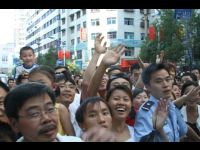 Fans in the streets of Guiyang, the capital city of Guizhou Province.