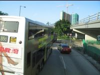 Rob-B-Hood advertisement on the side of a Kowloon Motorbus. Photo taken through the window of a bus near Kowloon City.