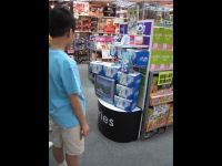 At a hobby shop in Mong Kok, a display was set up with the Rob-B-Hood music video playing.