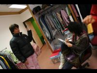 Jackie poses for Charlene Choi as she sketches him.