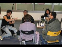 Discussing a scene at the set in Cyberport.
