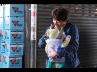 Jackie entertains Matthew on location in Yau Ma Tei.