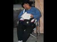 This is one of Jackie's favorites because the guy's book is still open to the page he was reading. Jackie took this photo.