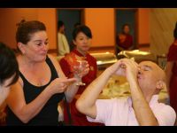 Rafaella De Laurentis shares a toast with Peter Pau.