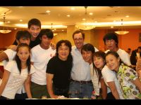 Director Rob Minkoff joins Jackie, the JC Stunt Team, Jackie's assistant Dorothy, make-up artist Si Jie and a friend for a photo.