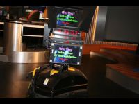 This is a teleprompter that's a robot. Everything it does is run by computer from a control booth.