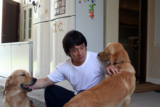 Jackie tries his best to keep the dogs still for a photo.