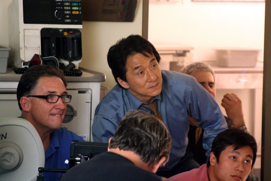 Jackie watches a complicated action scene being filmed.