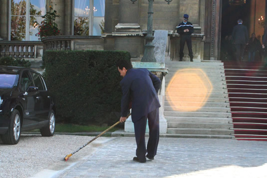 Jackie sweeping up in Paris.