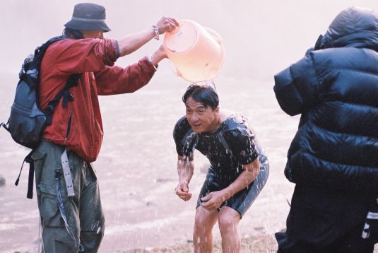 Ken Lo pours warm water over Jackie.