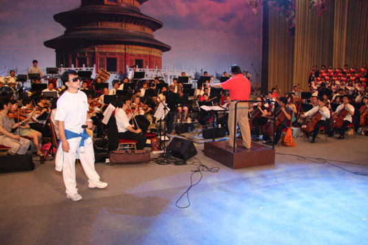 Jackie attends rehearsal for a charity event at the Great Hall of the People (August 3, 2008)