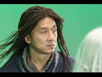 Filming in front of the green screen.