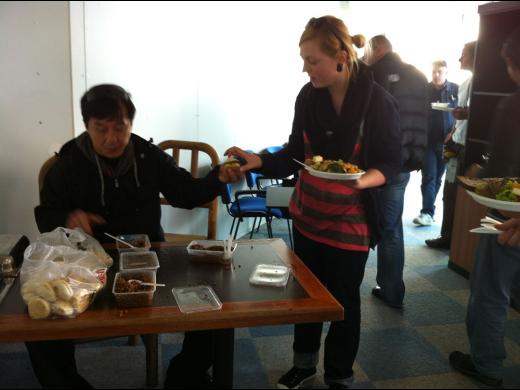 Jackie shares Chinese burgers.